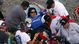 A fan is treated for injuries sustained from debris that went into the stands following a crash on the last lap of the DRIVE4COPD 300 at Daytona International Speedway.