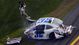 NASCAR Nationwide Series driver Kyle Larson (32) walks away from the remains of his car after crashing on the last lap of the DRIVE4COPD 300 at Daytona International Speedway.