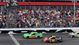 Danica Patrick (10), the first woman ever to start on a Sprint Cup pole, leads Jeff Gordon (24) to the green flag at the start of the 2013 Daytona 500.