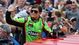 Danica Patrick waves to the crowd as she is introduced before the 2013 Daytona 500 at Daytona International Speedway.
