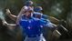 In this multiple exposure photo, Toronto Blue Jays pitcher R.A. Dickey throws a knuckleball.