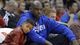 Retired star Shaquille O'Neal watches a Clippers game with son Shaquir on Jan. 12, 2013.