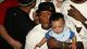 Bulls guard Nate Robinson holds then-5-month-old son Nahmier while finding out his Washington Huskies were a No. 1 seed in the 2005 NCAA tournament.