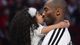 Lakers guard Kobe Bryant kisses daughter Natalia during halftime of the 2013 NBA All-Star Game. Flip through this gallery to see more NBA stars with their children.
