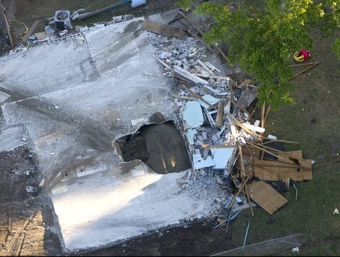 Sinkhole on This Aerial Photo Shows The Giant Sinkhole At The Home Of Jeff Bush