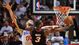 Game 17: March 8 vs. Philadelphia 76ers. LeBron James and Dwyane Wade, shown making a layup in front of Sixers center Spencer Hawes, combined for 47 points in a game the Heat trailed by nine in the third quarter. Score: 102-93.