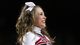 A Davidson Wildcats cheerleader performs during a second-round game against the Marquette Golden Eagles at Rupp Arena.