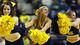 Michigan Wolverines cheerleaders cheer on the team against the South Dakota State Jackrabbits during the second round of the 2013 NCAA tournament at The Palace.
