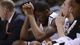 Second round: Oklahoma State forward Michael Cobbins hangs his head on the bench during the closing moments of the Cowboys' second-round loss to Oregon. The Ducks prevailed 68-55 in San Jose.