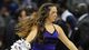 A Kansas State Wildcats cheerleader performs for the crowd before their second-round game against the La Salle Explorers at the Sprint Center. La Salle won 63-61.