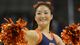 A Syracuse Orange cheerleader performs in the second-round game against the Montana Grizzlies.