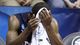 Second round: Belmont forward Kerron Johnson covers his head in disappointment as the clock winds down on the No. 11 Bruins' 81-64 loss to No. 6 Arizona in Sale Lake City.
