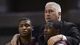 Second round: Montana coach Wayne TInkle, top, tries to console guards Kareem Jamar, left, and Will Cherry in the closing moments of the No. 13 Grizzlies' 81-34 loss to No. 4 Syracuse in San Jose.