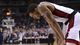 Second round: UNLV guard Anthony Marshall can only hang his head after the No. 5 Rebels were upset by No. 12 California 64-61 in San Jose.