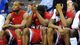 Second round: Western Kentucky players hang their heads on the bench as their bid to upset top-seeded Kansas ends with a 64-57 loss in Kansas City.