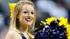 A Michigan Wolverines cheerleader cheers on her team during their third-round game against the Virginia Commonwealth Rams at The Palace at Auburn Hills.