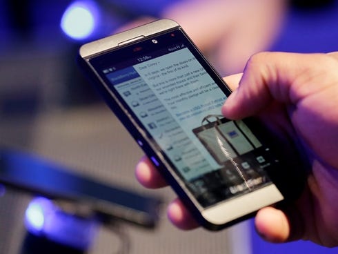 A person tries out a BlackBerry Z10 in New York when it was announced Jan. 30.