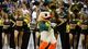 The Oregon Ducks mascot and cheerleaders celebrate after the third round of the NCAA basketball tournament against the Saint Louis Billikens at HP Pavilion. Oregon defeated Saint Louis 74-57.