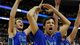 Florida Gulf Coast forward Filip Cvjeticanin (15), forward Eddie Murray (23) and forward Chase Fieler (20) celebrate an 81-77 win over San Diego State in the second half during the third round of the NCAA basketball tournament at Wells Fargo Center.