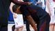 Khalif Wyatt of the Temple Owls is comforted by a teammate after being defeated by the Indiana Hoosiers in the third round.