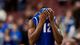 Creighton Bluejays guard Jahenns Manigat  pulls his jersey over his head after loosing to the Duke Blue Devils 66-50.
