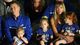 FGCU head coach Andy Enfield sits with his family, including wife Amanda Marcum, during the team's Selection Sunday event.