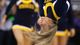 A La Salle Explorers cheerleader flips during a break in the game against the Wichita State Shockers.