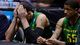 Oregon Ducks center Waverly Austin, left, and center Tony Woods react in the second half during the semifinals of the Midwest regional against the Louisville Cardinals at Lucas Oil Stadium.