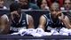 Michigan State Spartans players Derrick Nix and Adreian Payne react in the second half during the semifinals of the Midwest regional of the 2013 NCAA tournament against the Duke Blue Devils at Lucas Oil Stadium.