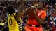 Syracuse's Jerami Grant grabs a rebound in front of Marquette's Jamil Wilson in the first half.