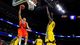 Syracuse's Brandon Triche goes up for a layup in the second half while Marquette's Jamil Wilson tries to defend.