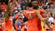 East Regional final (Washington): Syracuse's Michael Carter-Williams (1) and forward James Southerland (back) celebrate in the final seconds of the Orange's 55-39 win.