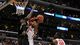 Ohio State's Deshaun Thomas shoots against Wichita State's Ehimen Orukpe in the first half of the West Regional final at the Staples Center in Los Angeles.
