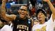 Wichita State's Carl Hall, left, celebrates winning the West Regional final 70-66 over Ohio State.