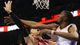 Game 1 in Oklahoma City: Thunder 120, Rockets 91 - Thunder forward Kevin Durant blocks Rockets guard Carlos Delfino's shot.