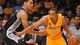 Game 3 in Los Angeles: Spurs 120, Lakers 89 - Lakers guard Andrew Goudelock drives past Spurs guard Danny Green.