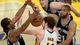 Game 4 in Los Angeles - Lakers forward Pau Gasol gets caught up between two Spurs defenders.