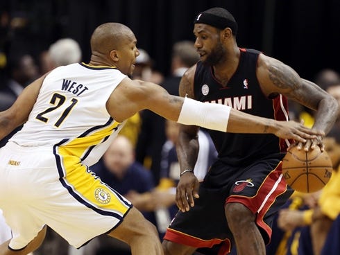 Miami Heat forward LeBron James, right, and Indiana Pacers forward David West were each fined $5,000 for their flopping in Game 4 of the Eastern Conference finals.