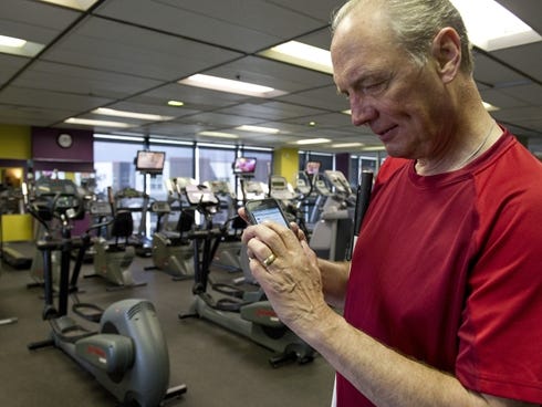 James Gashel, 66, keeps track of his workout schedule on his iPhone. Gashel, who is blind, uses VoiceOver, an audible screen reader.