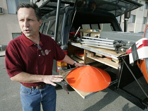 Tornado chaser Tim Samaras was one of the people killed Friday when twisters hit Oklahoma. In this 2006 photo, Samaras shows the probes he uses when trying to collect data from a tornado.
