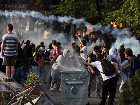Young Turks clash with security forces in Ankara, Turkey, Sunday, June 2, 2013. Protests in Istanbul and several other Turkish cities appear to have subsided, after days of fierce clashes following a police crackdown on a peaceful gathering. The demo