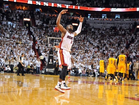 Heat guard Dwyane Wade celebrates during the third quarter of Game 7 of the Eastern Conference finals vs. the Pacers.