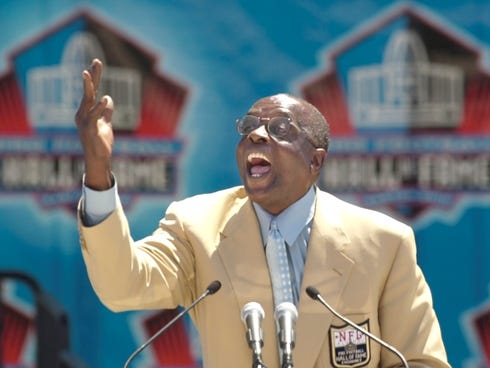 Hall of Fame defensive end Deacon Jones presents the late coach George Allen for enshrinement into the Pro Football Hall of Fame in Canton, Ohio Saturday, Aug. 3, 2002.