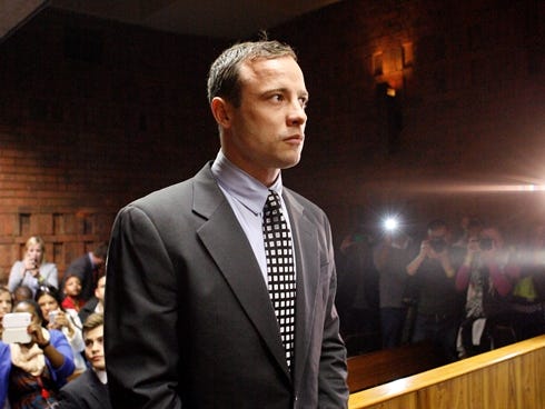 Oscar Pistorius appears in the magistrates court in Pretoria, South Africa, Tuesday, June 4, 2013.  His murder trial has been postponed until Aug. 19.