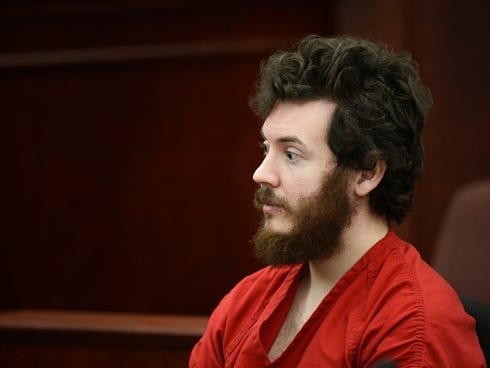 James Holmes, Aurora theater shooting suspect, sits in the courtroom during his arraignment in Centennial, Colo., in a March 12 file photo.