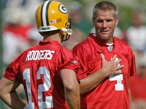 Aaron Rodgers and Brett Favre (4) were teammates for three seasons before Favre was traded to the Jets prior to the 2008 season.