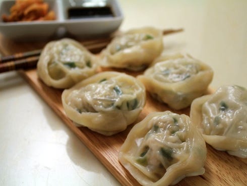 Korea: The varieties of mandu available in Korea are incredibly diverse. Some are boiled, bite-size, and filled with pork and scallions (mul mandu), others are deep-fried (goon mandu), and others are steamed, filled with kimchi, and require a few bit