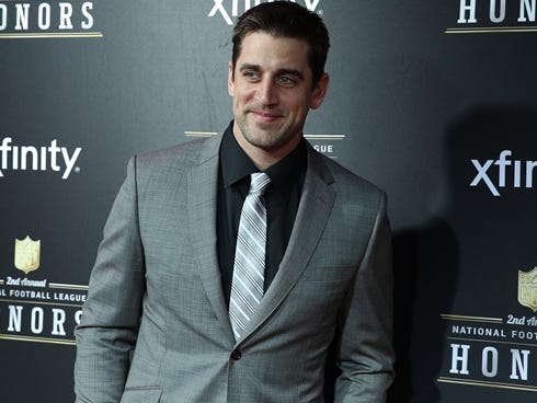 Green Bay Packers quarterback Aaron Rodgers walks the red carpet prior to the Super Bowl XLVII NFL Honors award show.
