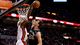 Game 2 in Miami: Heat 103, Spurs 84 - Miami Heat small forward LeBron James (6) blocks the shot of San Antonio Spurs center Tiago Splitter (22).