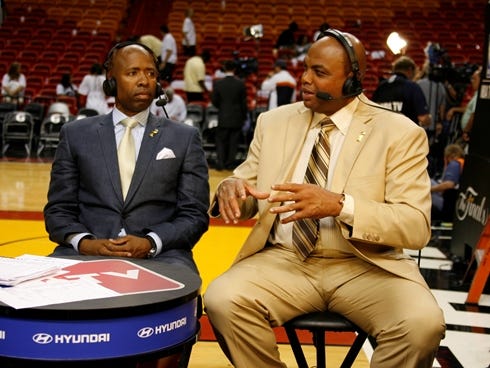 Kenny Smith and Charles Barkley talk during a TNT NBA Finals show in 2011.